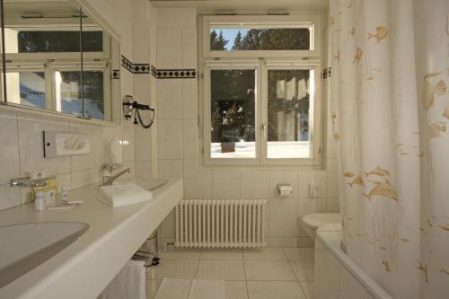 Esplanade Swiss Quality Hotel Давос Стая снимка